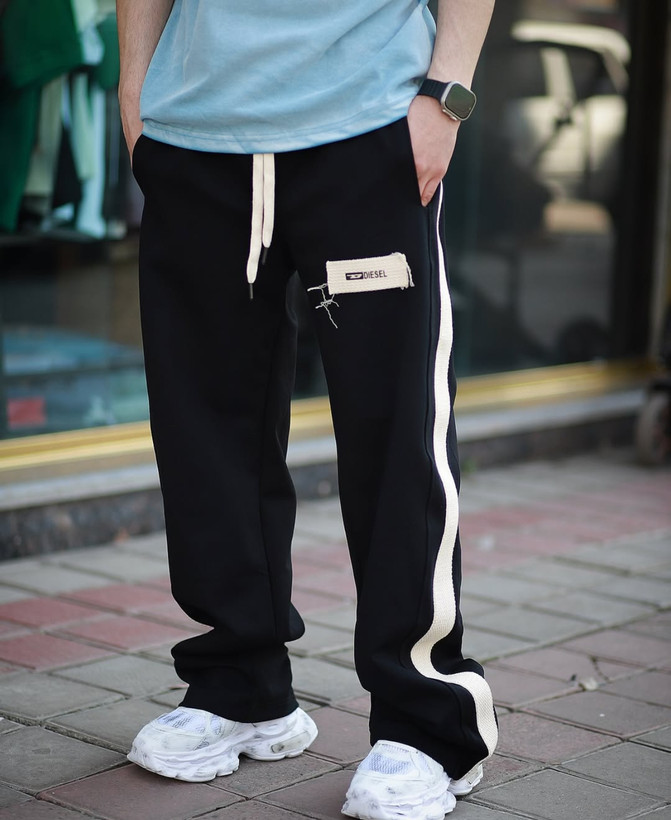 شلوار بگ بالانسیاگا با دیزاین نوار کنفی سفید | فوقالعاده شیک